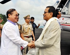 The Governor designate Shri JP Rajkhowa received by Chief Minister Shri Nabam Tuki at Raj Bhawan helipad on his arrival at Itanagar on 30th May 2015